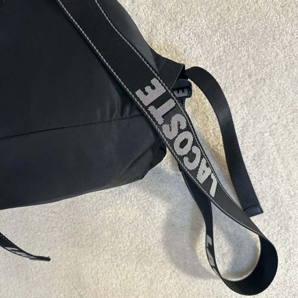Lacoste Women's Solid Black Cinch Flap Nylon Bag Backpack